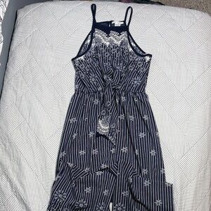 Miley and Molly Sleeveless Floral Stripe Wide leg Romper with Tie Waist Accent